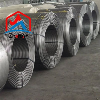Filferro amb nucli per a la modificació d'aliatges